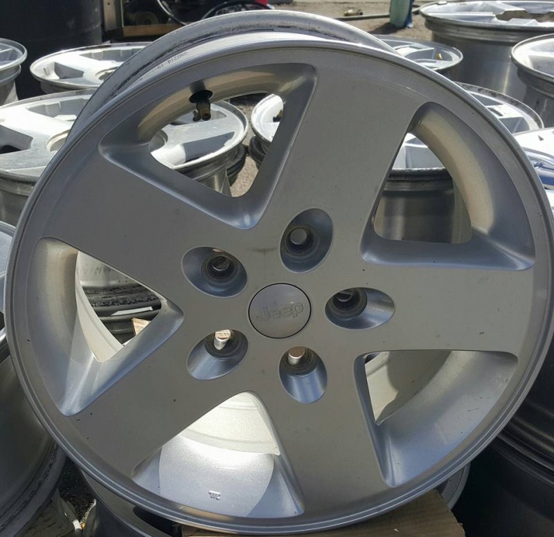 17×7.5 5×5.0 factory Jeep wheels
